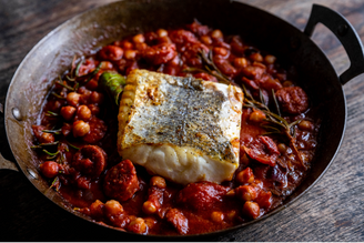 Ling fillet cooked on a bed of chorizo and chickpeas.
