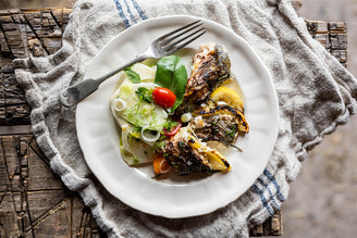 Barbecued Whole Sea Bass with Fennel, Tomato, Chilli & Mint, by Mitch Tonks