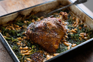 Whole Baked Shoulder of Lamb with White Beans & Nettles