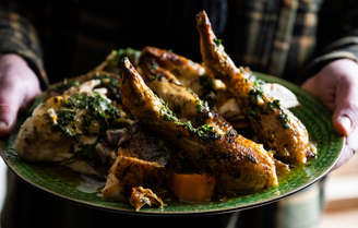 Roast properly free range Chicken with garlic, herbs, lemon, and winter vegetables.