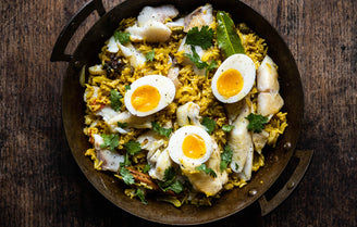Kedgeree with smoked haddock and boiled egg in a pan