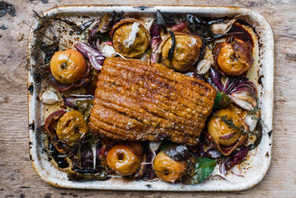 Roast Pork Belly with Baked Apples, by Gill Meller