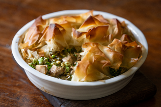 Spring Chicken Pie with Fresh herbs, peas, broad beans, free range chicken thighs, a luscious creamy sauce, and a crunchy topping of filo pastry.