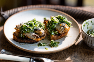 Grilled Sardines on toast with Chimichurri Sauce.