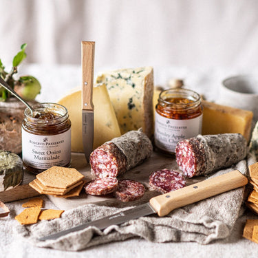 A Spread of Artisan Cheeses, Charcuterie, Small batch Preserves and Crackers, The Perfect Grazing Board for Sharing.