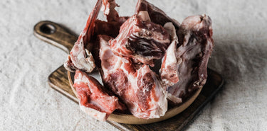 A whole, raw Grass Fed Beef Ox Heart.
