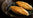 Properly free range chicken breasts cooking in a pan