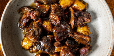 A meal including slow cooked grass fed beef