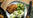a meal with native breed pork and vegetables