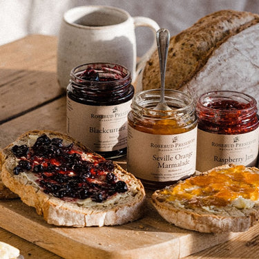 Selection of Jams and Marmalades Spread On Toast.