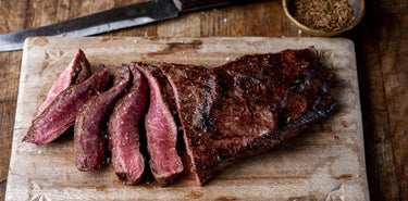 A cooked and sliced grass fed beef steak