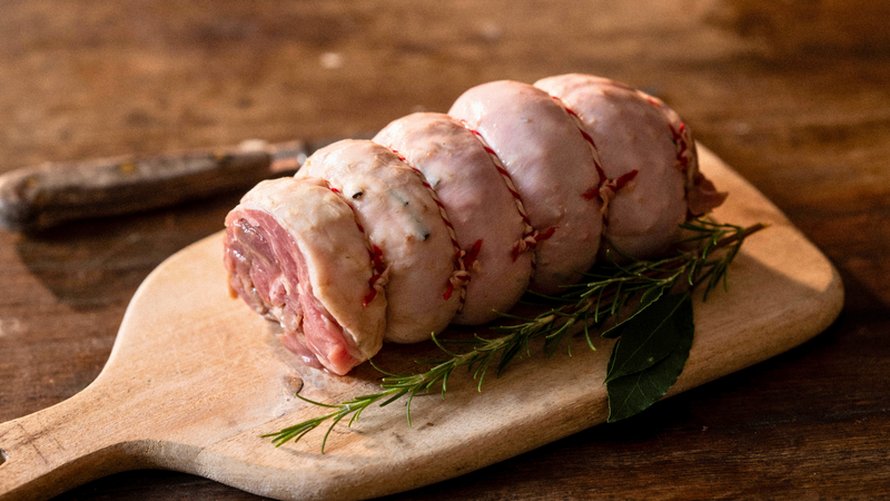 A raw, rolled, properly free range boneless turkey leg