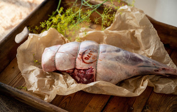 A raw and ready to cook whole Leg of Mutton.