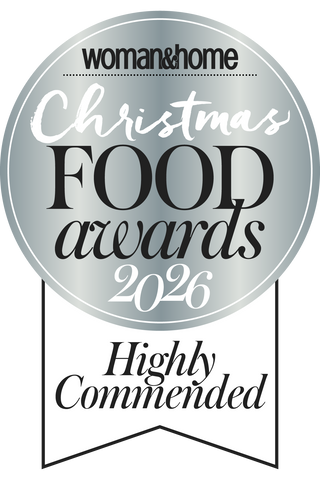 A circular silver award badge reading 'Woman & Home Christmas Food Awards 2026' with 'Highly Commended' below on a white background.