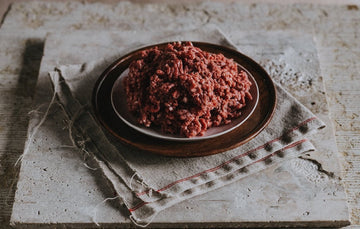 A plate of raw, grass fed lamb mince.
