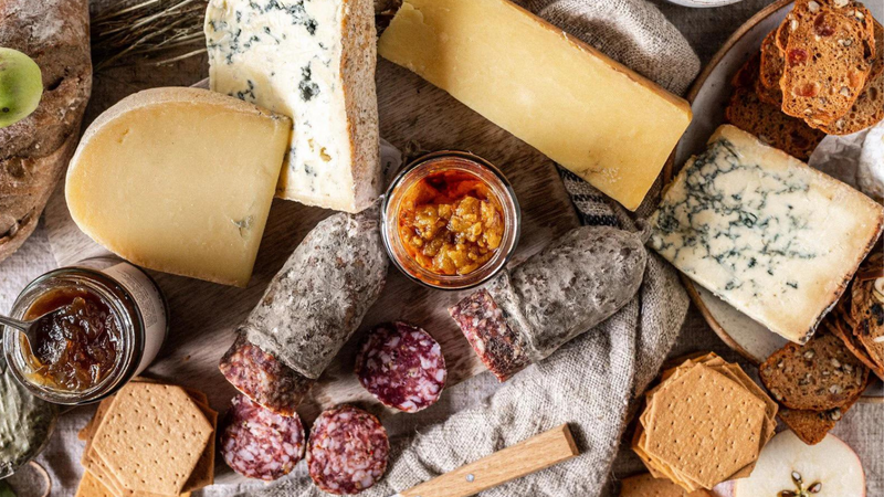 The Best of Miller's gluten-free crackers on a cheese board