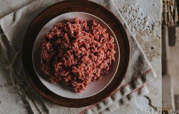 A plate of raw, grass fed lamb mince.