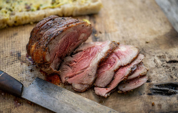 Sliced and tender pieces of Cull Yaw Mutton Rump on a chopping board.