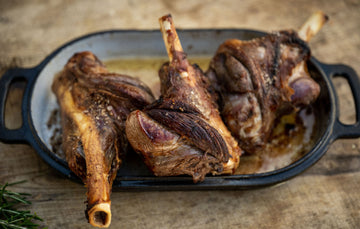 Cooked Cull Yaw Mutton Shanks in a casserole dish.