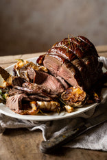 A cooked and sliced wild venison haunch