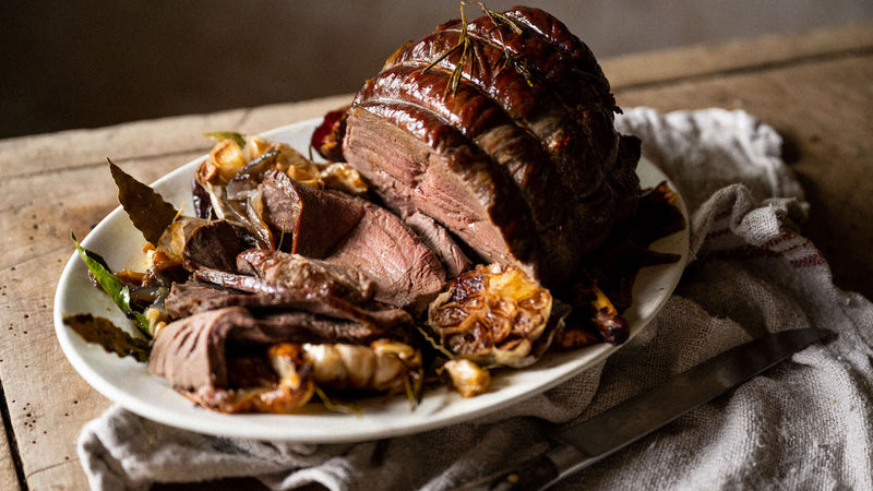 A cooked and sliced wild venison haunch