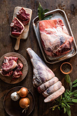 A selection of raw cuts of Cull Yaw Mutton with onions, garlic and herbs.