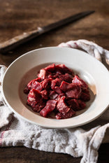 A bowl of raw Cull Yaw Diced Mutton.
