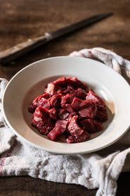 A bowl of raw Cull Yaw Diced Mutton.