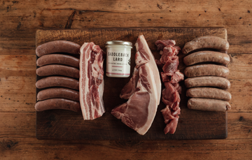Range Of Native Breed Pork Cuts Including Plain Pork Sausages, Pork Belly, Saddleback Lard and Diced Pork.