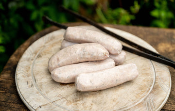Raw, Natural, free range, sage and onion turkey sausages.