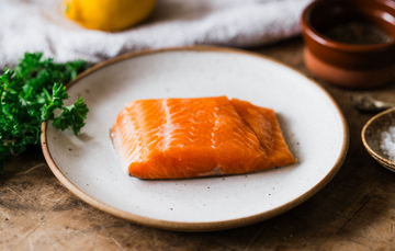 A raw fillet of sustainably caught chalk stream trout
