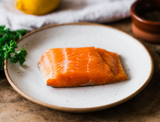 A raw fillet of sustainably caught chalk stream trout
