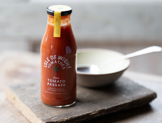 A bottle of pure tomato passata made by the tomato stall