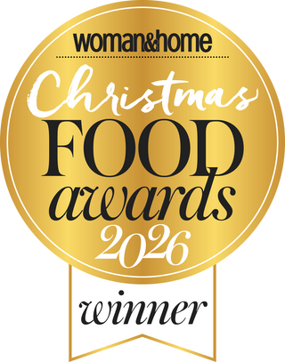 A gold circular award badge reading 'Woman & Home Christmas Food Awards 2026 winner' on a white background.