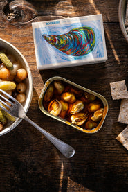 Tinned Mussels in Escabeche Sauce, served with Sourdough Crackers and Preserved pickled Onions and Gherkins.