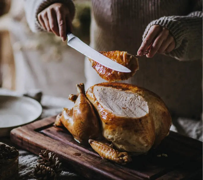 A properly free range turkey crown being carved