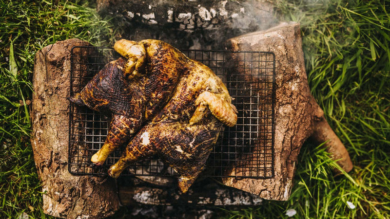 A barbecued, whole, properly free range spatchcock chicken