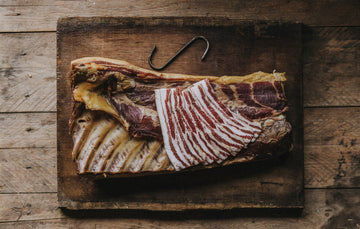 Traditionally Cured Beechwood Smoked Streaky Bacon from native breed pork.