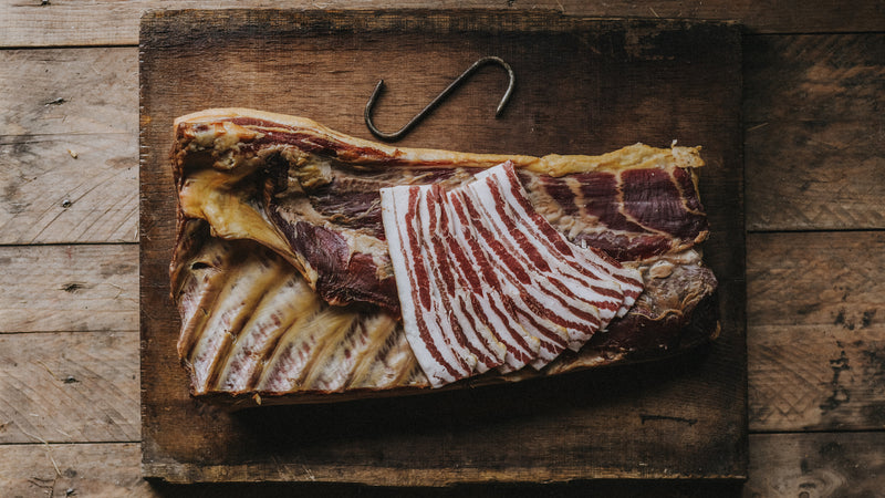 Traditionally Cured Beechwood Smoked Streaky Bacon from native breed pork.