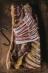 Traditionally Cured Beechwood Smoked Streaky Bacon from native breed pork.