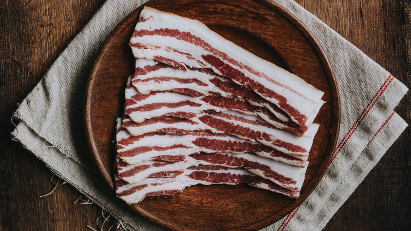 Traditionally Cured Beechwood Smoked Streaky Bacon from native breed pork.