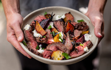 Fire Cooked grass fed Bavette Steak with Ember Roast Beetroots & Lovage.