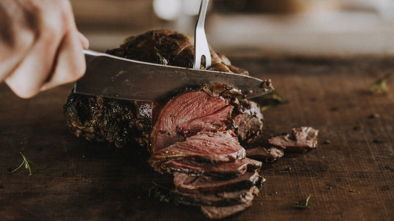 Cooked and sliced Grass Fed Boneless Leg of Lamb