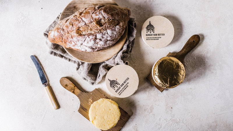 Sliced and buttered sourdough bread with Grass Fed Butter from Fen Farm Dairy.