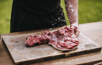 Grass Fed Butterflied Leg of Lamb Being Prepared For Cooking