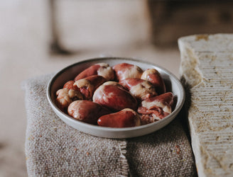 Raw, properly free range chicken hearts.