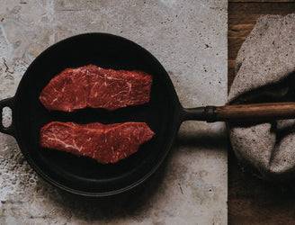 A cooked and sliced Grass Fed Beef Entrecote Steak.