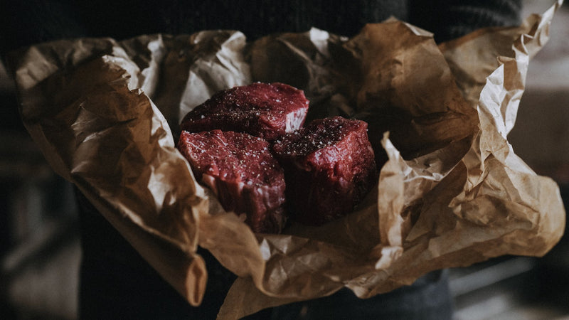 Raw Grass-Fed Beef Fillet Steaks with seasoning
