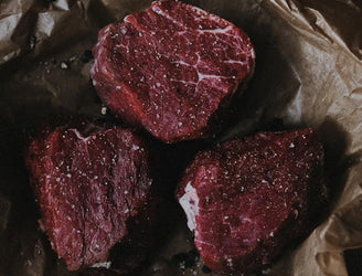 Raw Grass-Fed Beef Fillet Steaks with seasoning