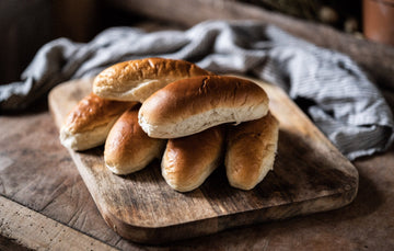 A stack of ultimate finger roll buns.
